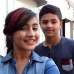 Meera Deosthale with her brother
