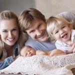 Shane Watson with his wife and children
