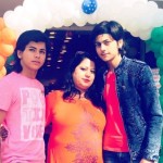 Abhishek Nigam with his mother and brother