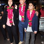 Neel Sethi with his parents