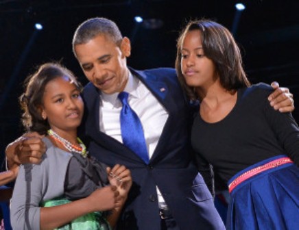 Obama with his daughters Malia and Natasha