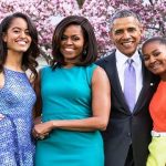 Michelle Obama with her children and husband