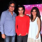 Talat Aziz with his wife and son
