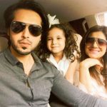 Fahad Mustafa with his wife and daughter