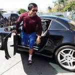 Pacquiao comes out of Mercedes Benz Sl 550