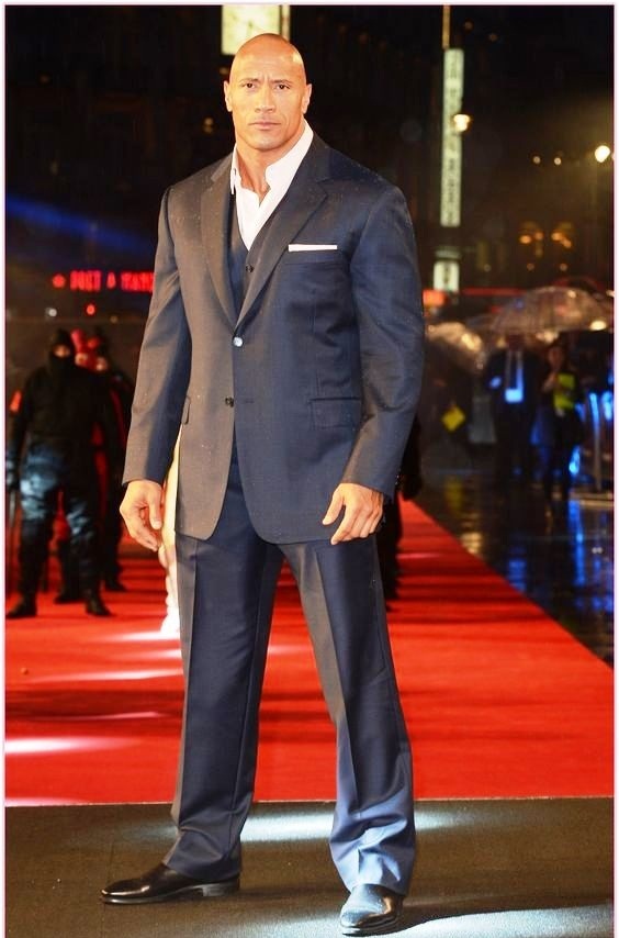 WHAT IS THE ROCK'S ACTUAL HEIGHT 