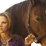 Mickie James with her horse