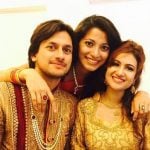 Neethusha Cherckal with her brother and sister in law