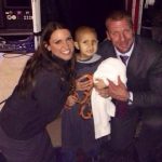 Stephanie and Triple H with Connor Michalek