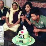 Suresh Raina with his parents and wife