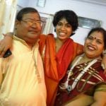 Charu Nigam with her parents