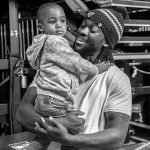 Kofi Kingston with his elder son