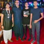 Rakeysh Omprakash Mehra with his wife and children