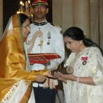 Asha Bhosle receiving Padma Vibhushan from President