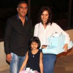Milan Luthria with his wife and daughter