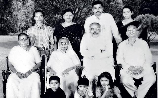 Narendra Modi with his Mother (left) and other Family Members