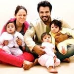 Vinay Anand with his wife and children
