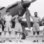 Arjan Singh as a flight lieutenant with pilots from No1 Squadron standing by a Hawker Hurricane