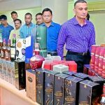 Excise Director Akun Sabharwal Shows Liquor Bottles Seized