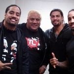 Jey and Jimmy Uso with their father Rikishi