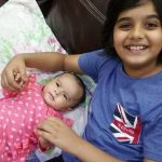 Uzair Basar with her younger sister