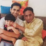 Waseem Mushtaq with his father and son
