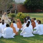 Jaggi Vasudev Teaching Yoga to His Students