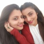 Neha Marda with her sister