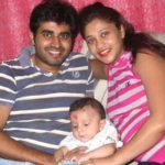 Yash Sinha with his wife and son