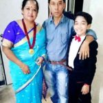 Akash Thapa with his parents