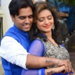 Bhakti Chauhan with her husband showing their tattoos on their right wrist