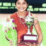 Young Sheethal Goutham with her winner's trophy (Tennis)
