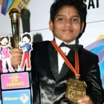 Hemant Brijwasi with his Lil Champs's Trophy