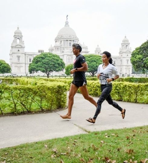 Milind Soman and Ankita Konwar doing running