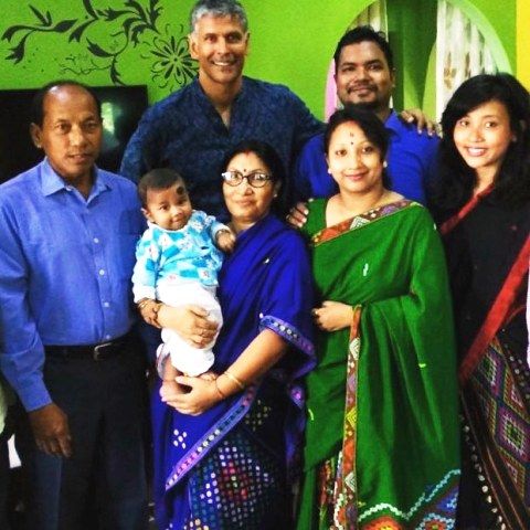 Milind Soman with Ankita Konwar and her family