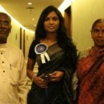 Usha Jadhav with her parents
