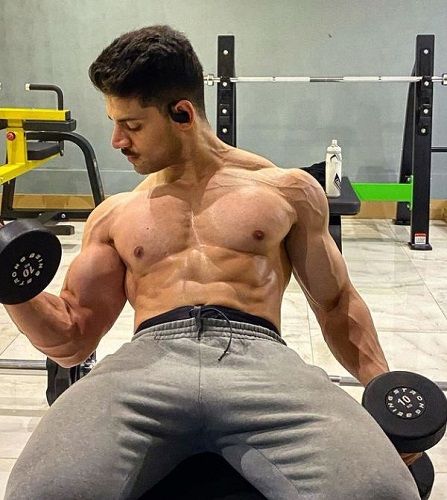 Sooraj Pancholi working out in a gym