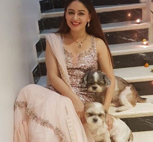 Mahhi Vij with her pet dogs