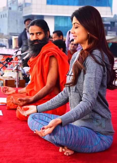 Shilpa Shetty doing yoga with Baba Ramdev