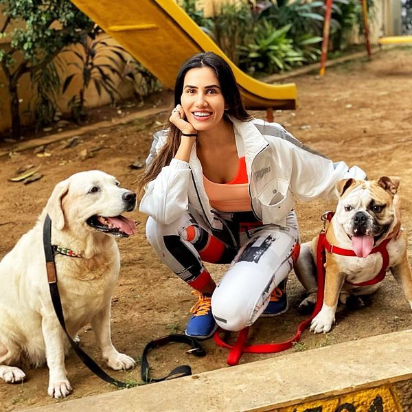Sonnalli Seygall with Her Dogs
