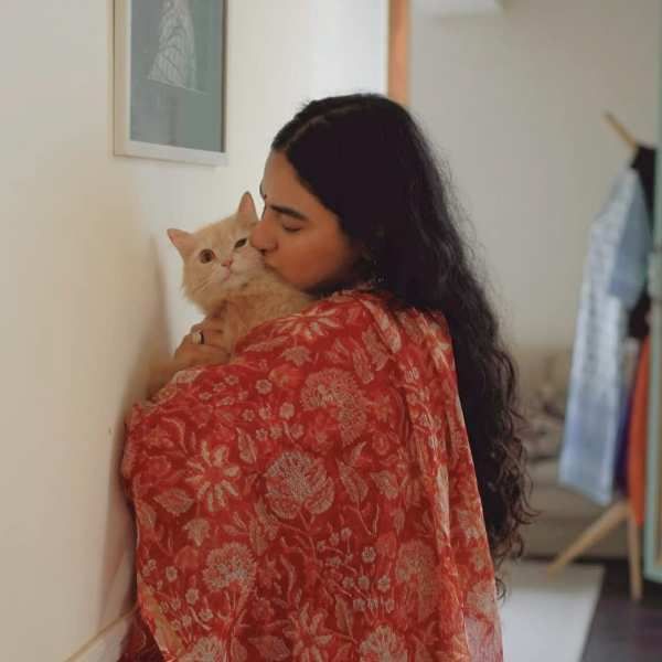 Priya Malik with her pet cat, Gundi Kaur