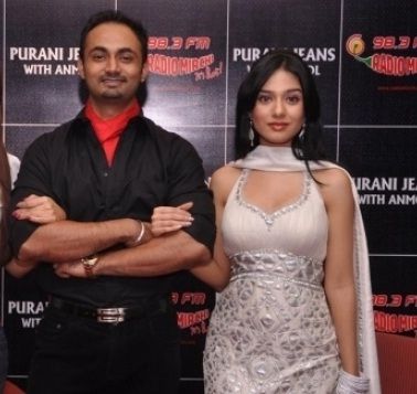 RJ Anmol with his wife, Amrita Rao