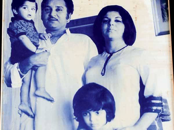 Sajid Khan (in his father's lap) with his parents and sister