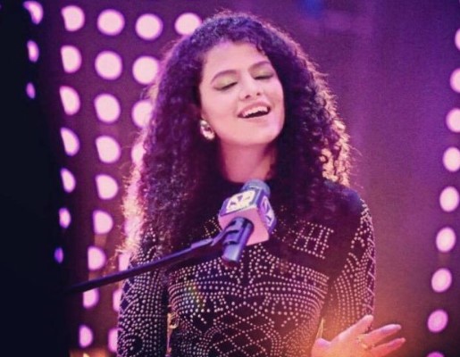 Palak Muchhal while singing a song