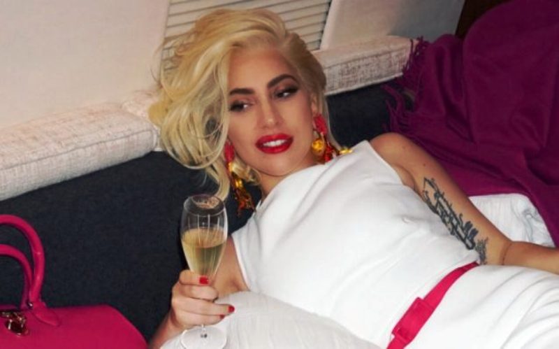 Lady Gaga with a glass of wine