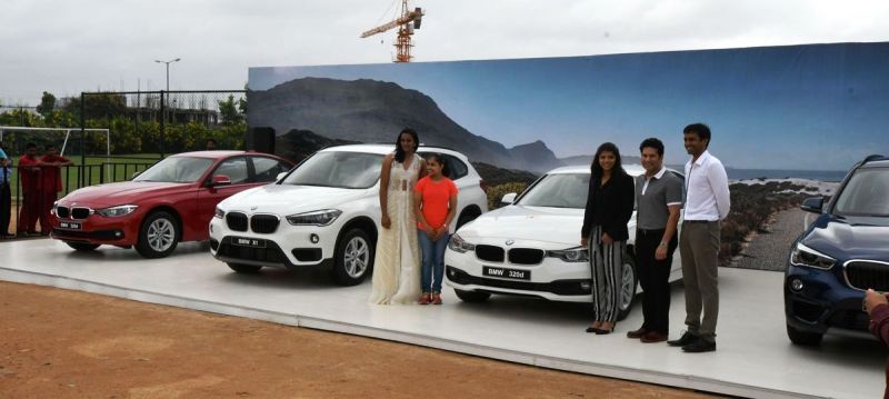 Dipa Karmakar Posing With The BMW Car In The Presence Of Sachin Tendulkar PV Sindhu And Sakshi Malik