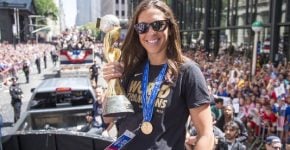 Carli Lloyd with the Golden Ball Trophy