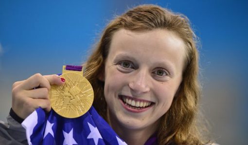 Katie Lendecky with the gold medal she won at the London Olympics