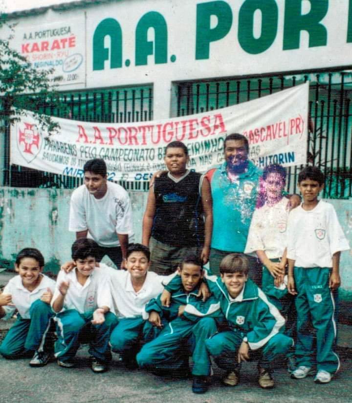 Neymar (second from right, sitting) with his Portuguesa Santista youth club teammates