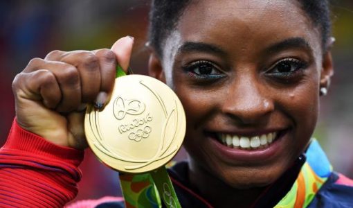 Simone Biles with her first Olympic Gold